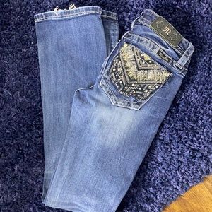 Used:has a few spots on back on jeans. Listed in photos